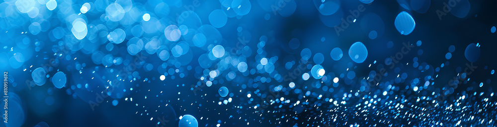 Blue background with bokeh lights and water drops, perfect for commercial or social media use. A blue banner with blurred droplets of rain on the surface creates a sense of depth in the space. Blue background with bokeh lights and water drops, perfect for commercial or social media use. A blue banner with blurred droplets of rain on the surface creates a sense of depth in the space.