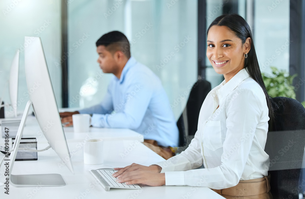 Computer, desk and portrait for woman in office, smile and typing on keyboard in workplace. Technology, creative agency or search editor for seo on pc for internet, online and email for female person Computer, desk and portrait for woman in office, smile and typing on keyboard in workplace. Technology, creative agency or search editor for seo on pc for internet, online and email for female person