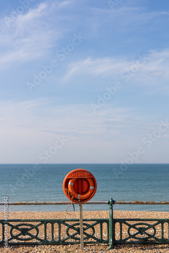 Life saver ring on a railing overlooking Brighton Beach