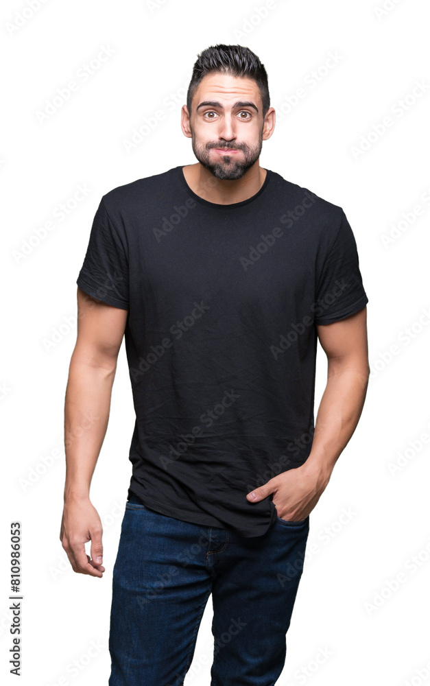 Young handsome man over isolated background puffing cheeks with funny face. Mouth inflated with air, crazy expression. Young handsome man over isolated background puffing cheeks with funny face. Mouth inflated with air, crazy expression.