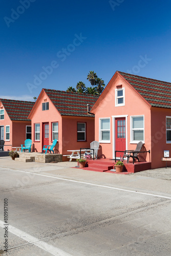 cute tiny symmetrical holiday home buildings at the beach of oceanside, california