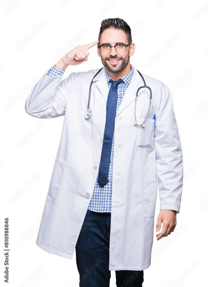 Handsome young doctor man over isolated background Smiling pointing to head with one finger, great idea or thought, good memory Handsome young doctor man over isolated background Smiling pointing to head with one finger, great idea or thought, good memory