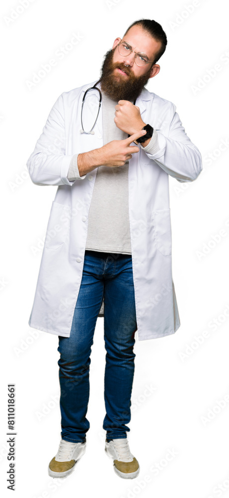 Young blond doctor man with beard wearing medical coat In hurry pointing to watch time, impatience, upset and angry for deadline delay Young blond doctor man with beard wearing medical coat In hurry pointing to watch time, impatience, upset and angry for deadline delay