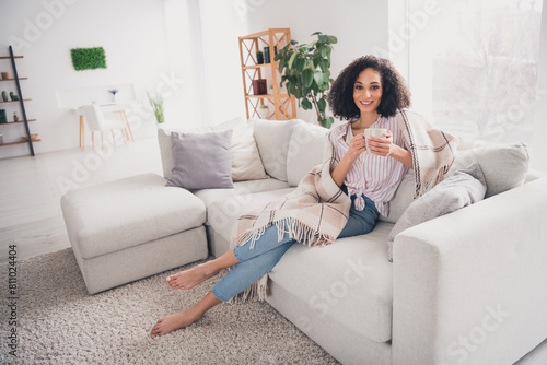 Full length photo of adorable sweet lady wear white shirt drinking tasty beverage indoors room home house