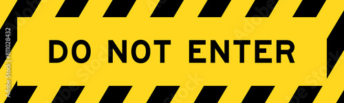 Yellow and black color with line striped label banner with word do not enter photo