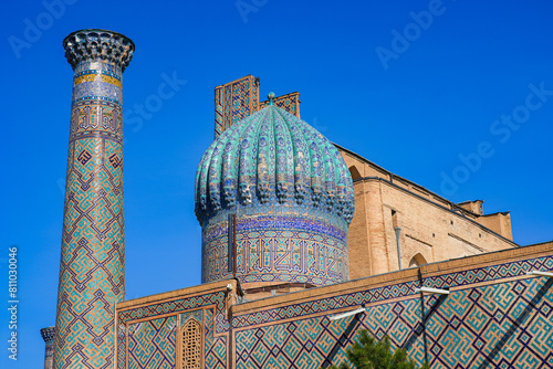 Mosaic-covered cupola of the Sher-Dor madrasah on the Registan Square in Samarkand, Uzbekistan