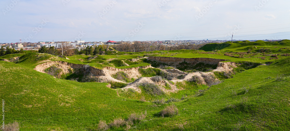 Afrasiyab (Afrosiyob) ancient settlement in ruins in Samarkand, Uzbekistan - Archaeological excavations on a grassy hill of Maracanda in Central Asia Afrasiyab (Afrosiyob) ancient settlement in ruins in Samarkand, Uzbekistan - Archaeological excavations on a grassy hill of Maracanda in Central Asia
