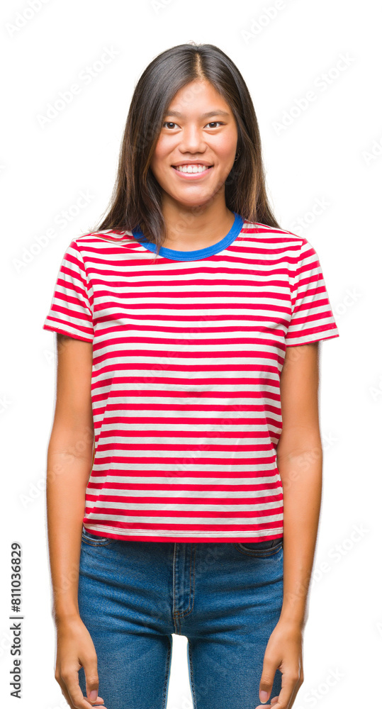 Obraz premium Young asian woman over isolated background with a happy and cool smile on face. Lucky person.