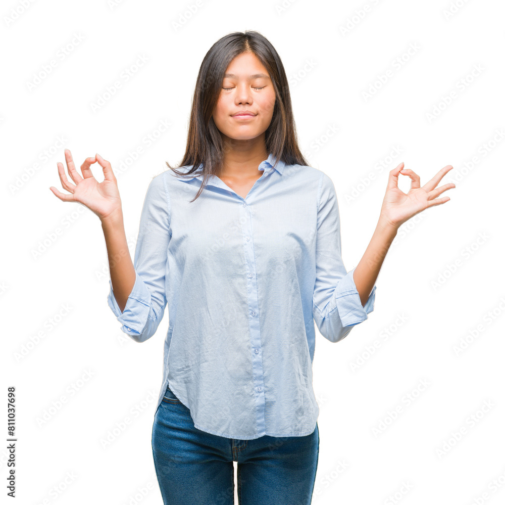 Young asian business woman over isolated background relax and smiling with eyes closed doing meditation gesture with fingers. Yoga concept. Young asian business woman over isolated background relax and smiling with eyes closed doing meditation gesture with fingers. Yoga concept.