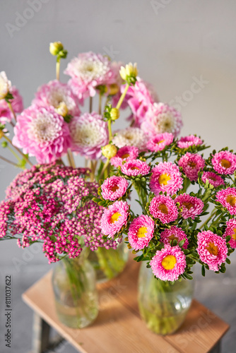 Wallpaper Mural A bouquet of pink and white flowers in a vase on a table Torontodigital.ca