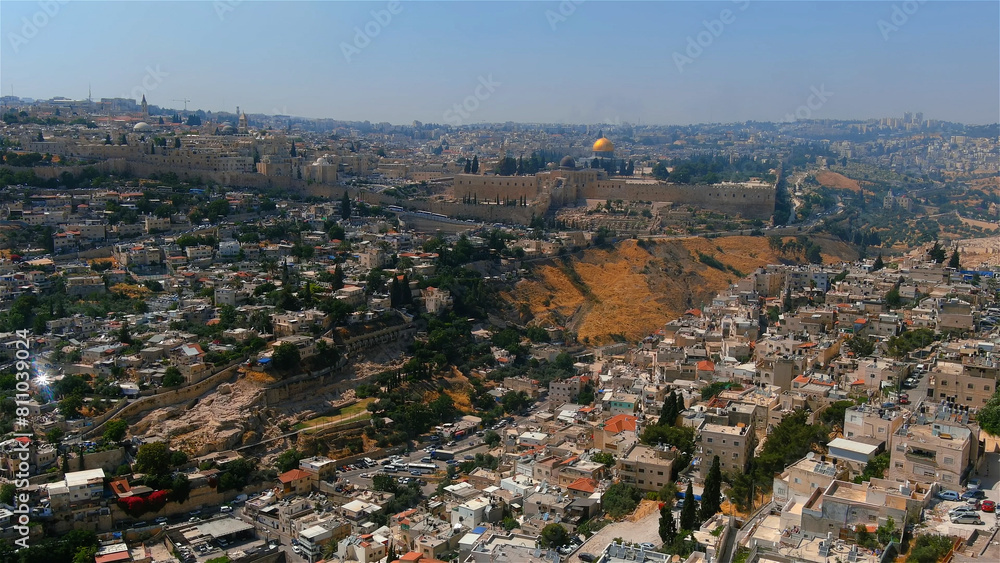 Fototapeta premium East jerusalem old city and arab neighborhood, aerial Beautiful drone shot from Old city of Jerusalem al Aqsa Mosque, June, 2022, israel