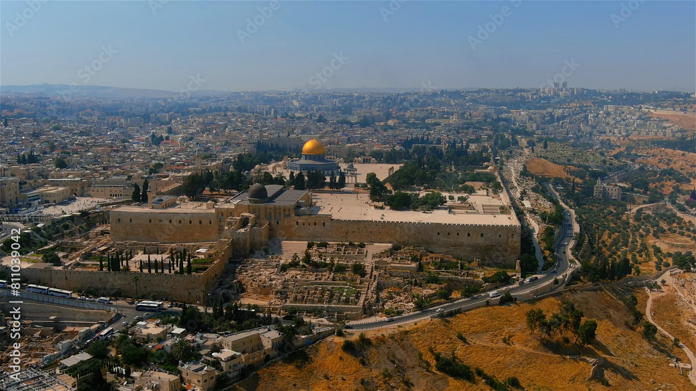 Fototapeta premium East jerusalem old city and arab neighborhood, aerial Beautiful drone shot from Old city of Jerusalem al Aqsa Mosque, June, 2022, israel