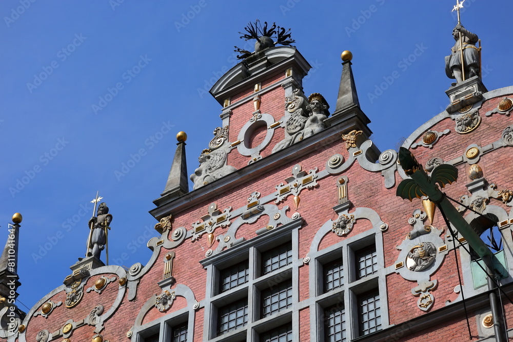 A facade of a historic tenement house in a Gothic city