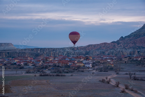 Sunrise in Cappadocia with colorful hot air balloons fly in sky over canyons, valleys morning tourist destination. Travel Turkey concept