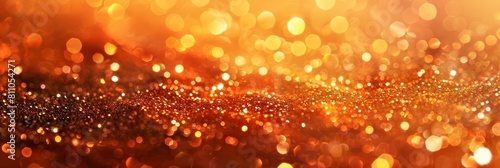This image evokes a sense of energy optimism and festive radiance through the captivating interplay of glowing tangerine light and sparkling amber particles The abstract blurred and defocused