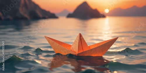 Small White Paper Boat In Big Ocean on sunset