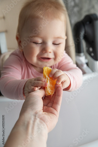 child eating orange