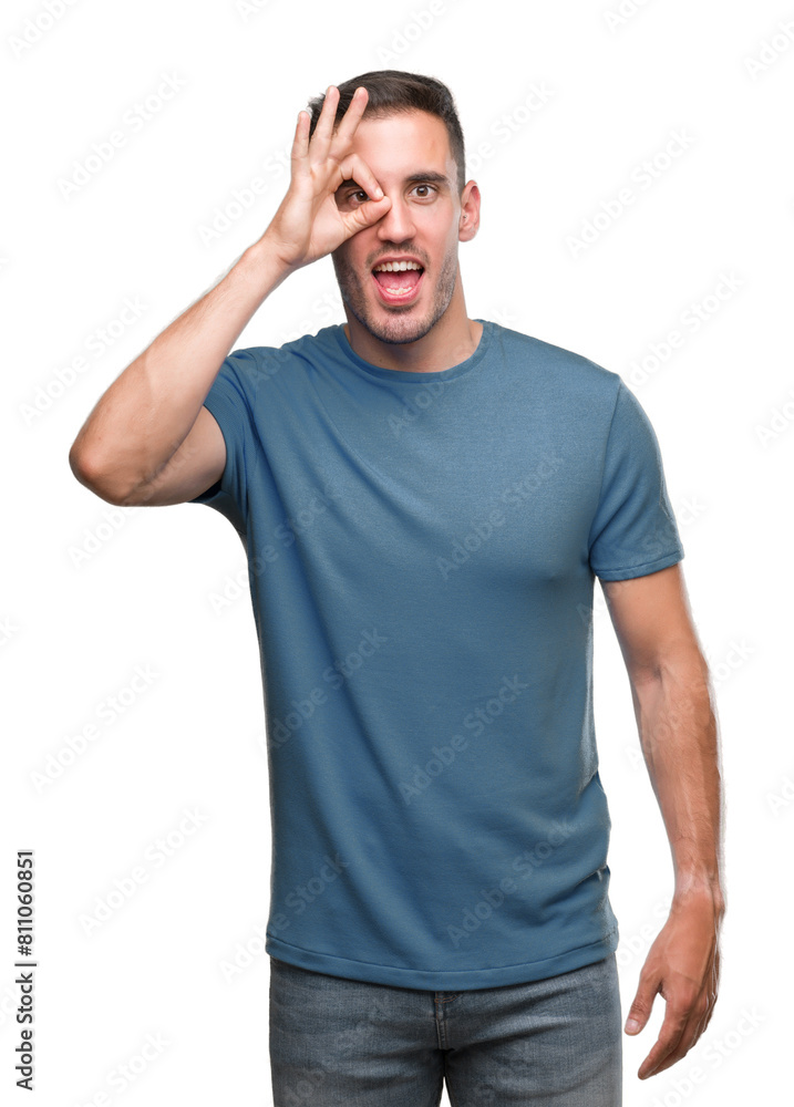 Handsome young casual man doing ok gesture with hand smiling, eye looking through fingers with happy face. Handsome young casual man doing ok gesture with hand smiling, eye looking through fingers with happy face.