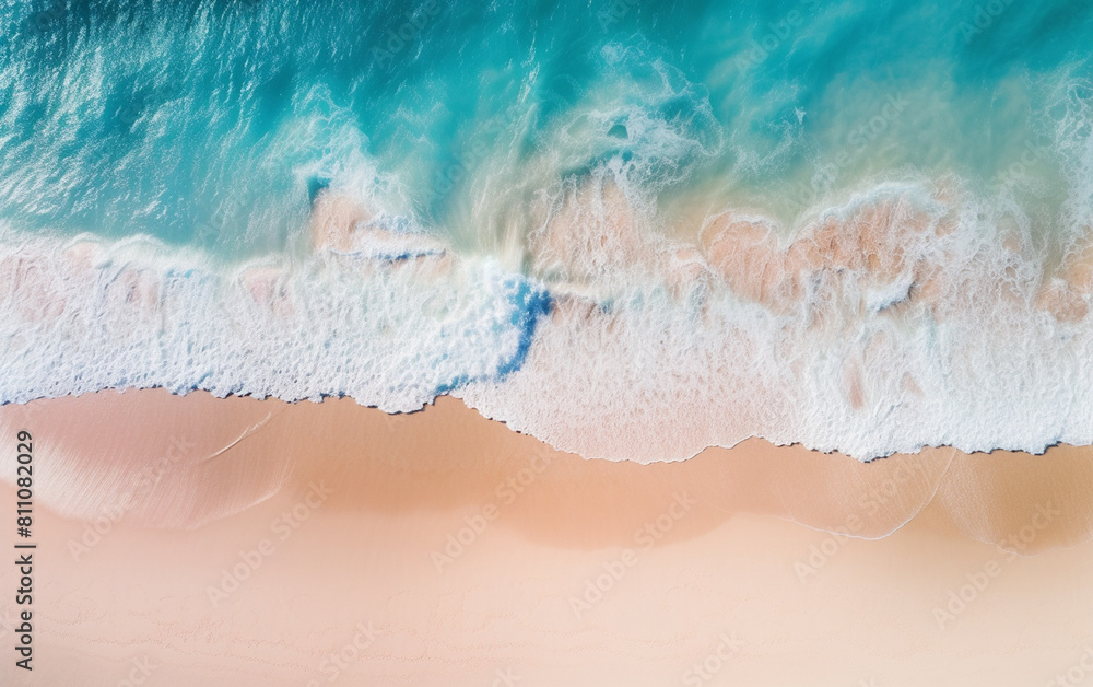 Top aerial view of the beach waves and sand