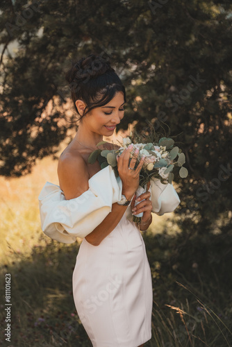 Captivating bride: Graceful beauty with bouquet in hand