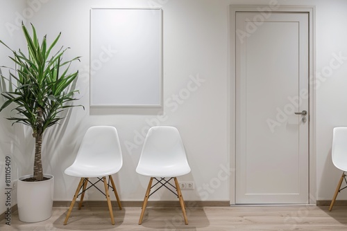 Photo of a white waiting room with an empty wall mockup, featuring chairs and one door for patient check-in
