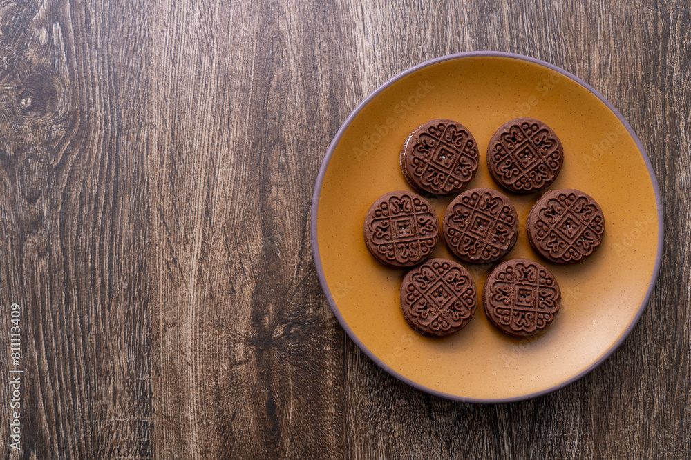 Cream-filled chocolate biscuits on a plate Cream-filled chocolate biscuits on a plate