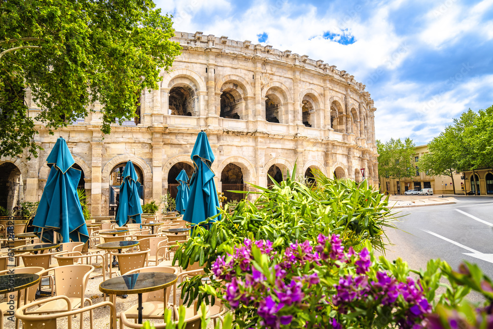 Nimes Amphitheatre historic landmark colorful street view