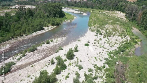 Aerial video of a river in a nature area near the town of Bologna Italy photo