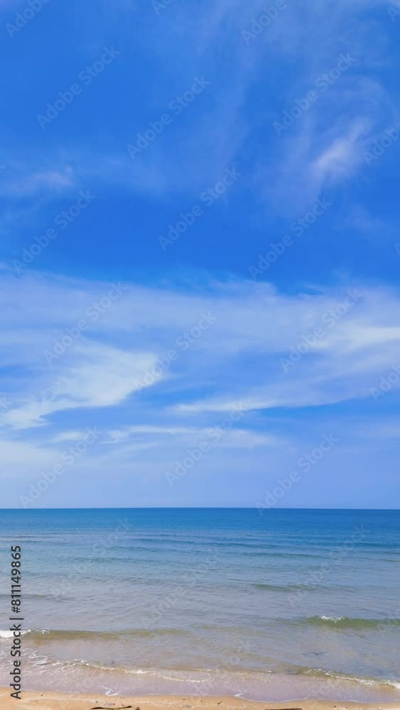View of sandy beach, sea and sky in summer with sea waves entering the natural white sandy beach. Chao Lao Beach sea area Chanthaburi Province, Thailand. 4K slow motion footage View of sandy beach, sea and sky in summer with sea waves entering the natural white sandy beach. Chao Lao Beach sea area Chanthaburi Province, Thailand. 4K slow motion footage