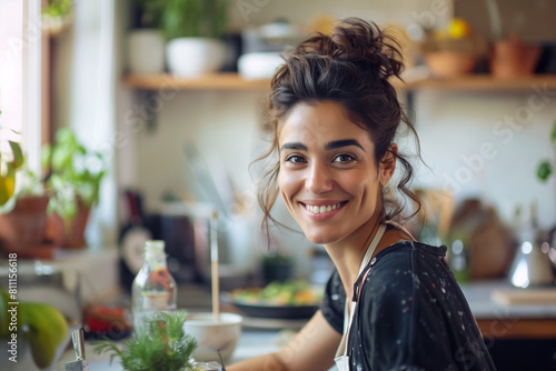 in natural light, a portrait showcases a radiant woman artist immersed in her creative process at home. With passion and focus, she puts the finishing touches on her latest masterp