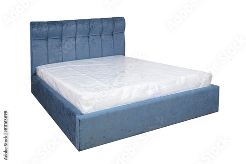 Double bed with soft headboard. Cushioned furniture.