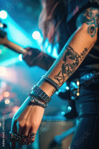 A woman showcasing a tattoo on her arm. Ideal for lifestyle and fashion blogs
