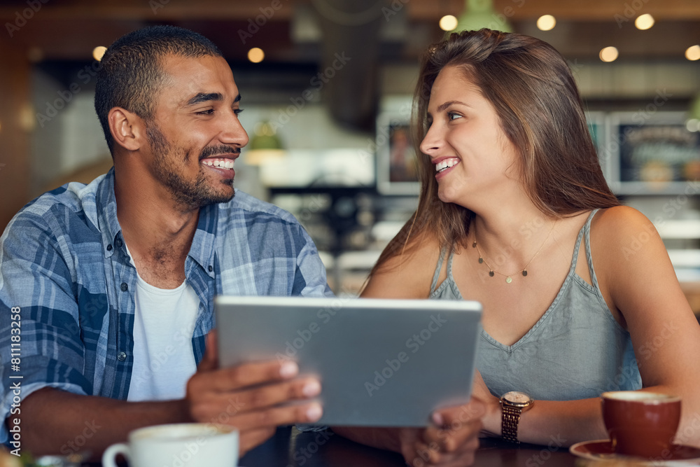 Happy, tablet and couple at cafe for food choice, menu or planning brunch meal for coffee shop date together. Digital, payment and app for online order at restaurant with customer experience survey Happy, tablet and couple at cafe for food choice, menu or planning brunch meal for coffee shop date together. Digital, payment and app for online order at restaurant with customer experience survey
