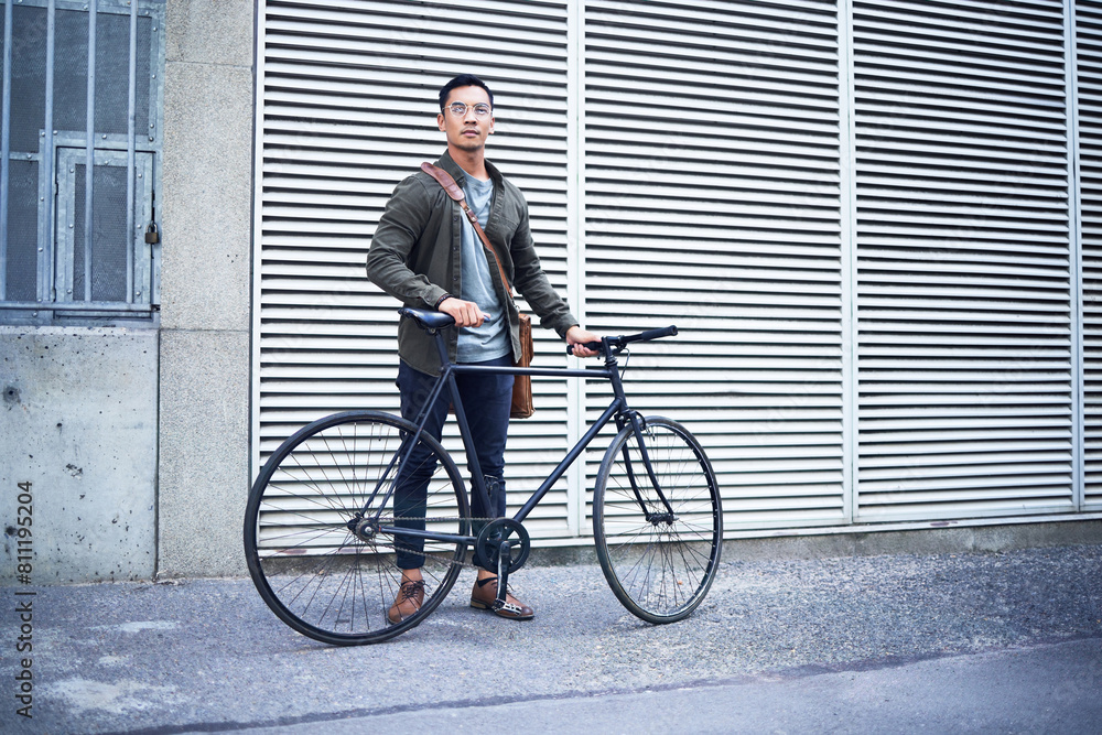 Travel, fashion and man with bicycle in city commuting to work for creative career. Transport, style and male designer with carbon footprint for cycling to office with bike in town in Amsterdam. Travel, fashion and man with bicycle in city commuting to work for creative career. Transport, style and male designer with carbon footprint for cycling to office with bike in town in Amsterdam.