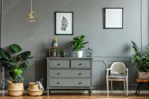A room with a grey dresser and a chair