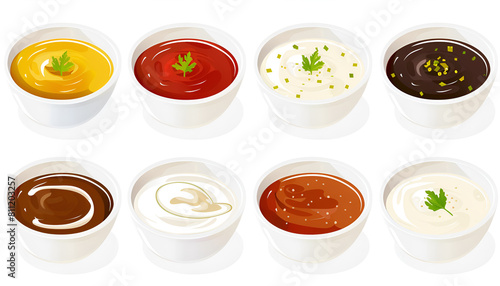 Set of different sauces in bowls isolated on white background