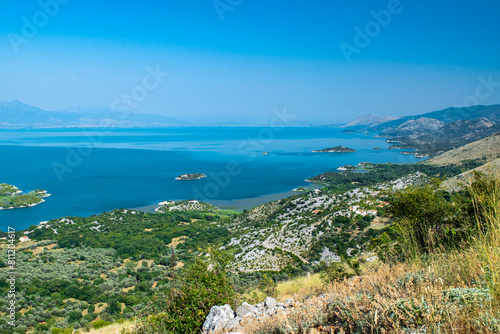 Viewpoint Donji Muriсi. Beautiful summer landscape of small green islands and blue waters of Lake Skadar near the border with Albania. Montenegro.