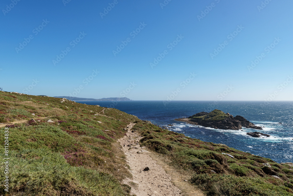 Cabo Touriñán and Cabo Finisterre in the background, Muxía, A Coruña province, Galicia, Spain Cabo Touriñán and Cabo Finisterre in the background, Muxía, A Coruña province, Galicia, Spain