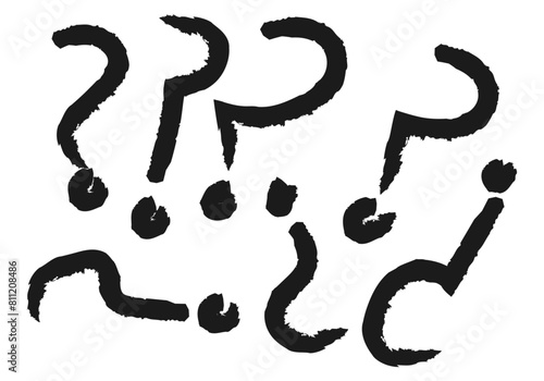 Patrón de interrogaciones negras hechas con pincel negro.