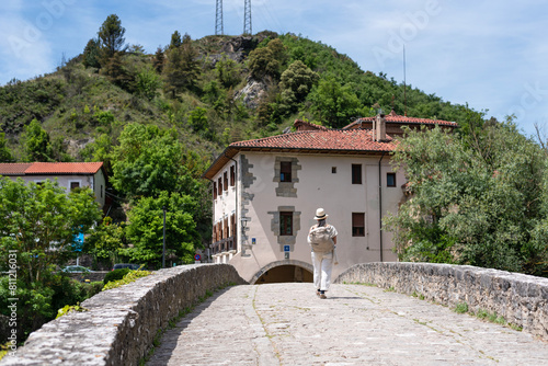 Pilgrim on the Trinity Bridge in Arre. Navarre. Way of St. James.Zubiri-Pamplona Stage photo