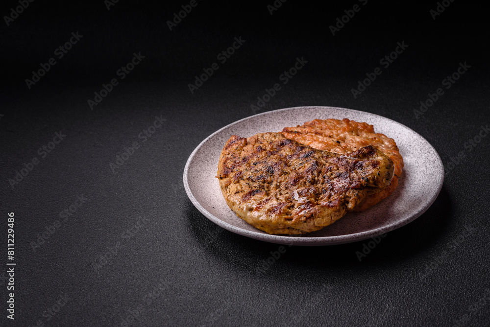 Delicious juicy pork steak with salt, spices and herbs Delicious juicy pork steak with salt, spices and herbs