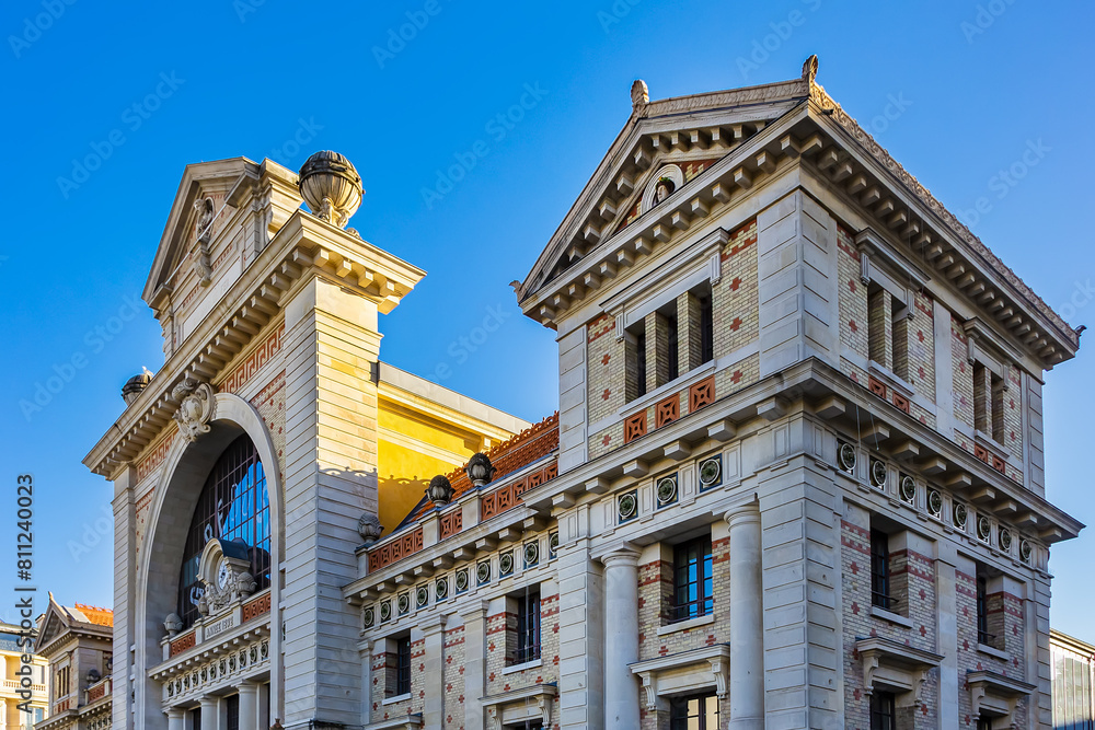 Obraz premium Architectural fragments of Gare du Sud (South Station, 1892), formerly a historic railway station, now a city library and food court. Nice, France.