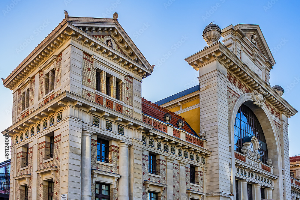 Fototapeta premium Architectural fragments of Gare du Sud (South Station, 1892), formerly a historic railway station, now a city library and food court. Nice, France.