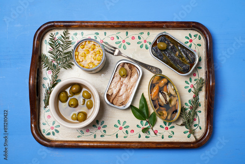 Cans of sardines, mackerel, mussels and sweet corn