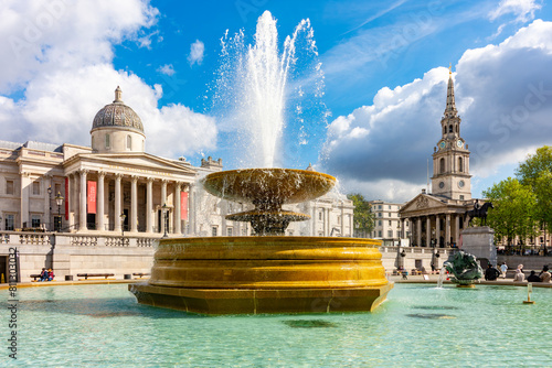 Photography Fountain on Trafalgar square with National Gallery at background, London, UK
