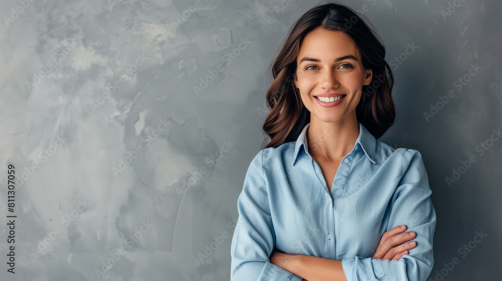 Happy, young, and confident professional woman with a radiant smile, posing with arms crossed on a bright background Happy, young, and confident professional woman with a radiant smile, posing with arms crossed on a bright background