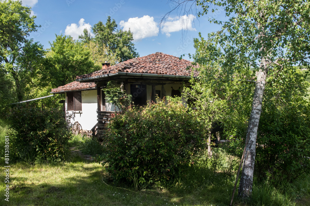 Rural country house with garden yard in spring time Rural country house with garden yard in spring time