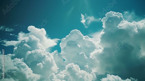 Amazing beautiful white fluffy cloudscape with a bright blue sky and sunlight shining through the clouds. photo