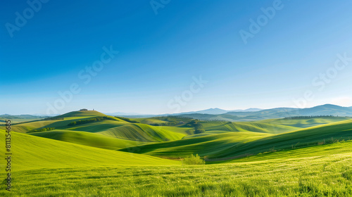 Lush green hills under a bright sunny sky  expansive and vibrant rural landscape
