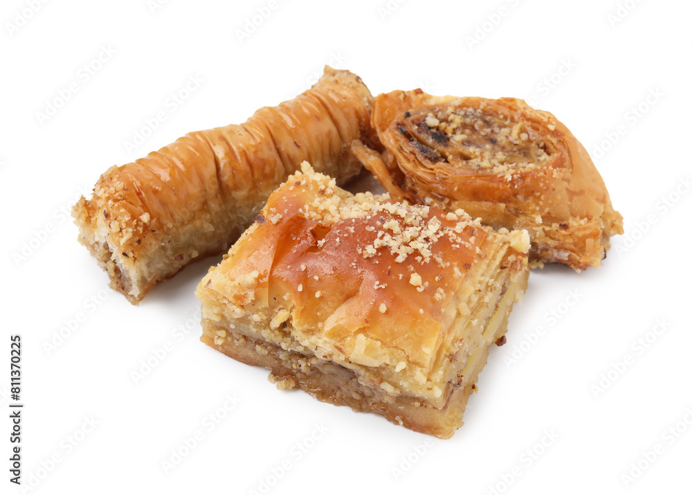 Eastern sweets. Pieces of tasty baklava isolated on white Eastern sweets. Pieces of tasty baklava isolated on white
